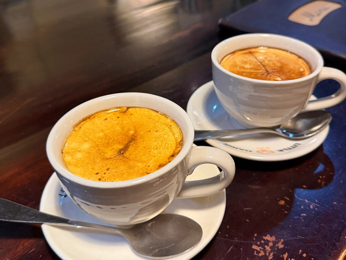 Vietnamese egg coffee topped with thick, golden whipped egg cream