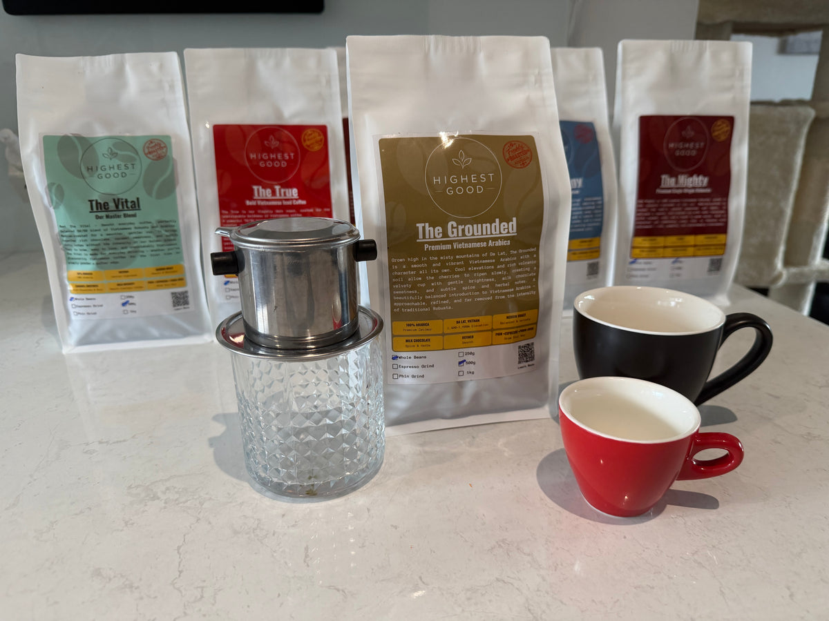 Highest Good The Grounded Vietnamese Arabica coffee bag with a phin filter and cups