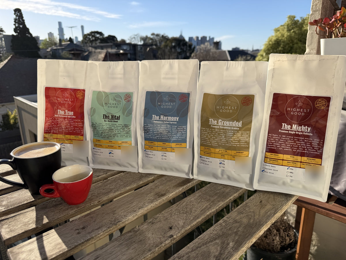 The full Highest Good Vietnamese coffee range of five blends lined up on a sunny Melbourne balcony